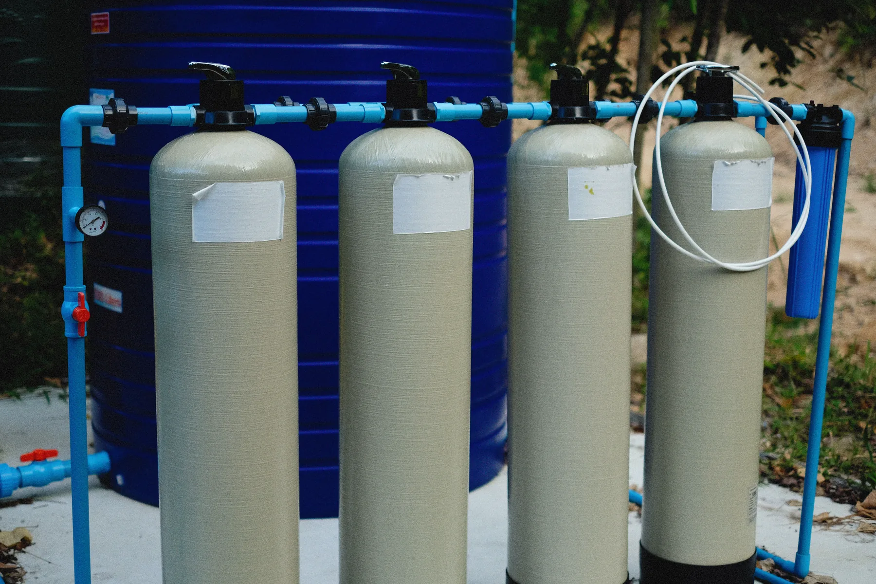 Representative water filtration tanks and pipe system